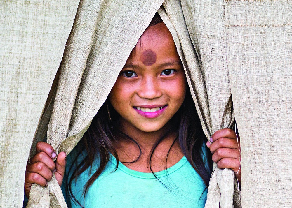MANDATORY CREDIT: Réhahn Photography/REX Shutterstock. Only for use in this story. Editorial Use Only. No stock, books, advertising or merchandising without photographer's permission Mandatory Credit: Photo by Réhahn Photography/REX Shutterstock (5064716l) A child smiling in the village of Sapa Smiling faces of North Vietnam, Vietnam - Aug 2015 FULL COPY: http://www.rexfeatures.com/nanolink/r1mu A photographer has captured a series of striking portraits of Northern Vietnam's ethnic tribes. French photographer Réhahn captured the images on a recent roadtrip through Northern Vietnam's stunning mountains. There are many different ethnic tribes in the Northern Vietnam region, each with a unique traditional clothing and a unique language. In the pictures stunning portraits can be seen of the locals, dressed in their unique colours and textile prints.