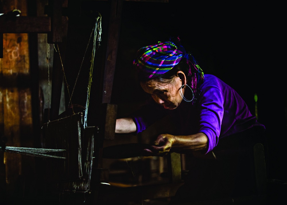 MANDATORY CREDIT: Réhahn Photography/REX Shutterstock. Only for use in this story. Editorial Use Only. No stock, books, advertising or merchandising without photographer's permission Mandatory Credit: Photo by Réhahn Photography/REX Shutterstock (5064716b) A woman of one of the Hmong tribes hand-weaving traditional costumes Smiling faces of North Vietnam, Vietnam - Aug 2015 FULL COPY: http://www.rexfeatures.com/nanolink/r1mu A photographer has captured a series of striking portraits of Northern Vietnam's ethnic tribes. French photographer Réhahn captured the images on a recent roadtrip through Northern Vietnam's stunning mountains. There are many different ethnic tribes in the Northern Vietnam region, each with a unique traditional clothing and a unique language. In the pictures stunning portraits can be seen of the locals, dressed in their unique colours and textile prints.