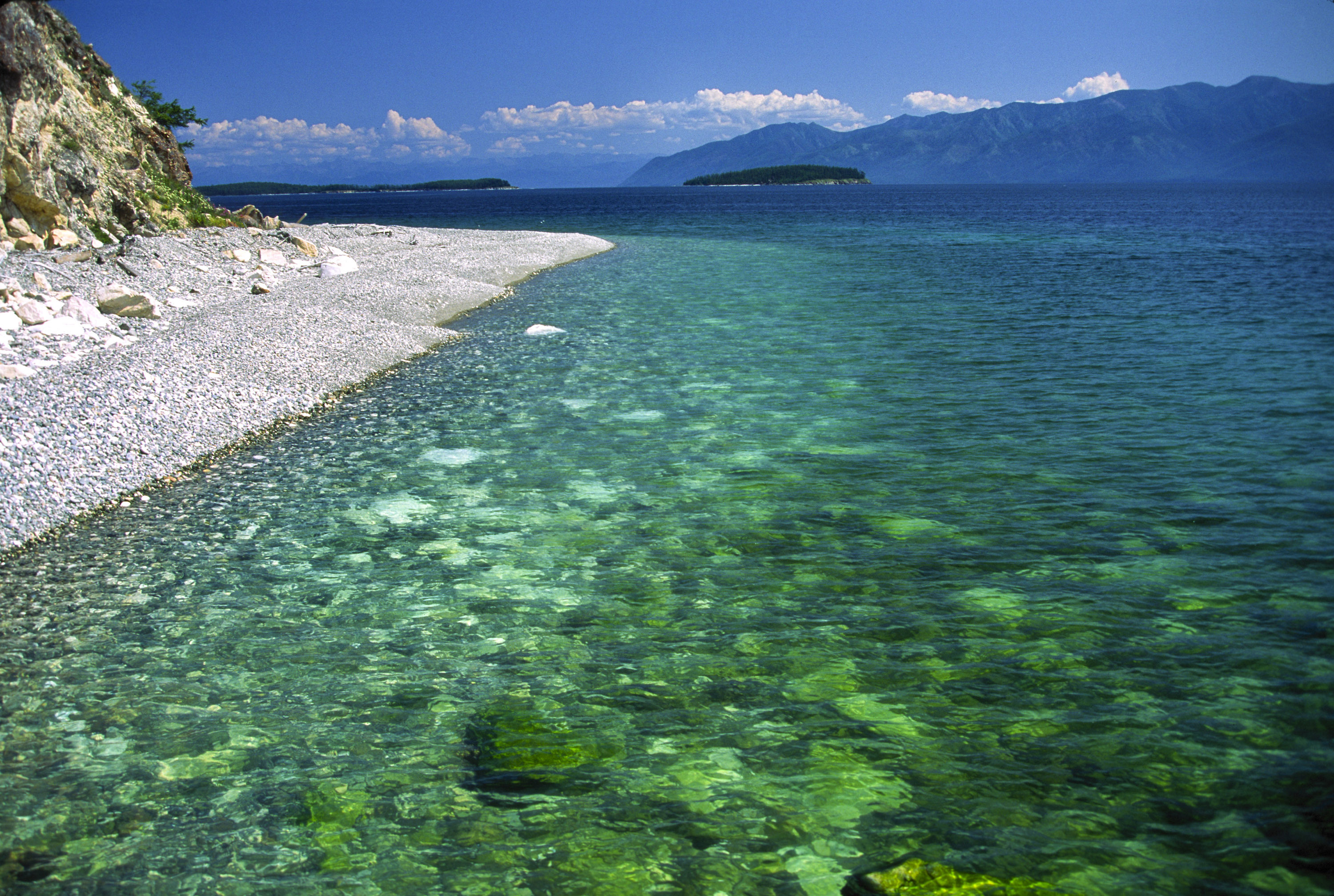 Zabaikalski National Park, Lake Baikal. Lake Baikal is the oldest (25 million years), deepest (5700 feet) and largest lake in the world by volume(it holds 20% of the earth's liquid fresh water). Threatened by pollution and most recently by an oil pipeline, Baikal has become a rallying point for Russian and international conservationists. Baikal was declared a World Heritage Site in 1996. Boyd Norton, the photographer here, worked with Russian and U.S. environmentalists to get Baikal designated a World Heritage Site.